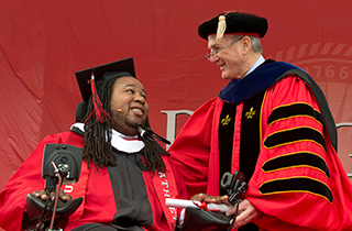 President Barchi handing Eric LeGrand his Diploma President Barchi handing Eric LeGrand his Diploma